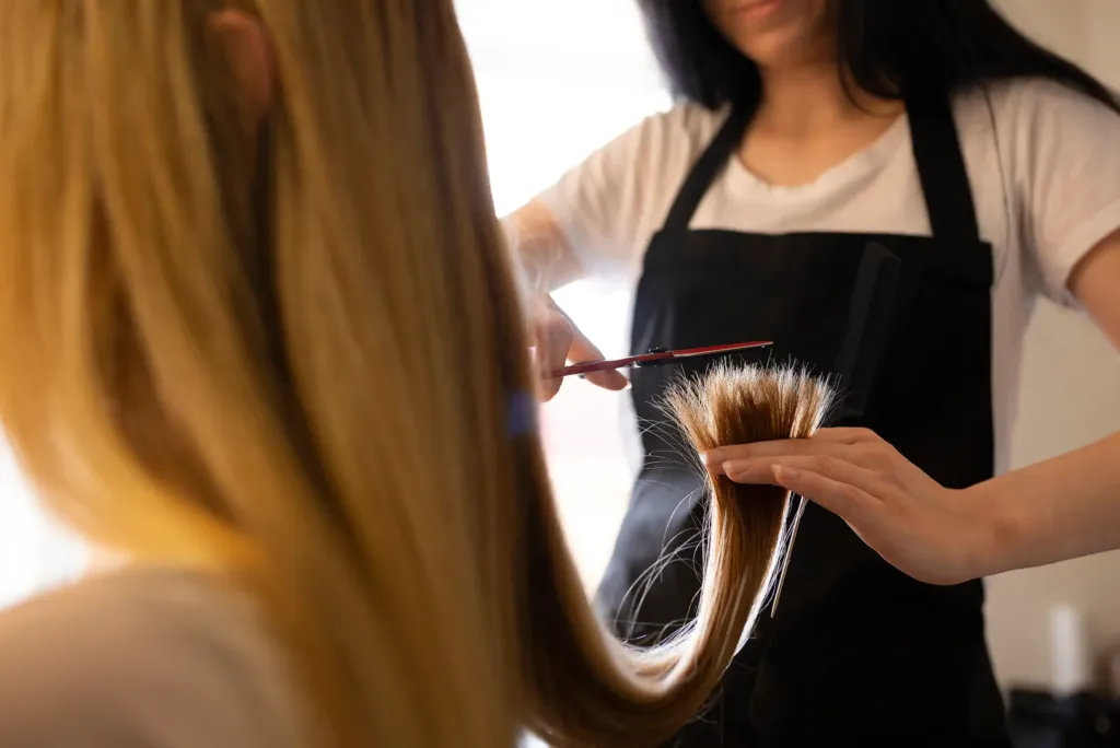 Haircut service at Scarlette Rose Salon Abu Dhabi. Our stylists create flattering haircuts for all hair types.
